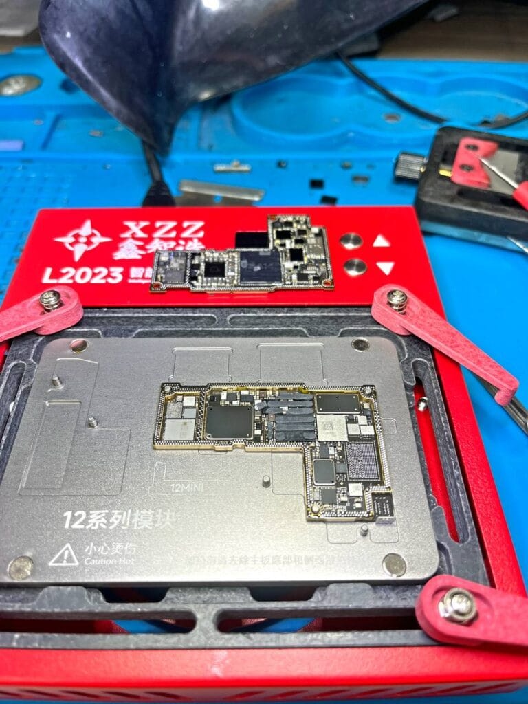 iPhone 12 Pro Max motherboard is taken out